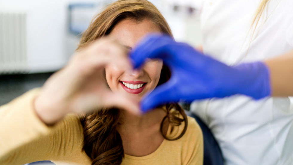 Patient making a love heart with hands